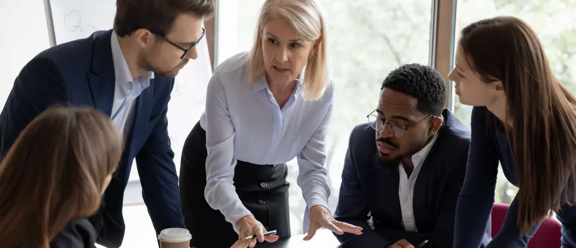 group of professions inside office discussing