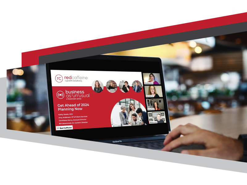 Hand using a laptop that shows a Red Caffeine webinar