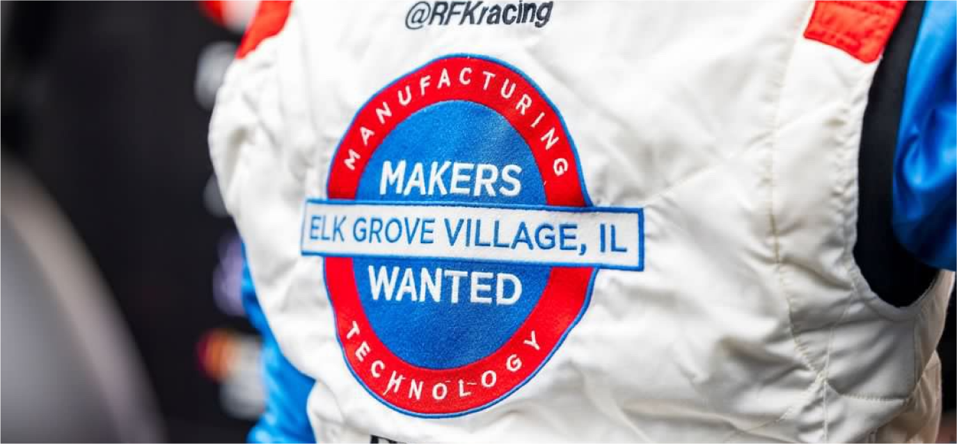 Close up of a garment with an embroidered logo for Elk Grove Village, IL Manufacturing Technology: Makers Wanted