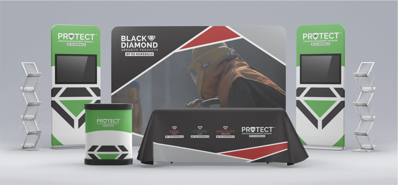 Digital mockup of a green, black, and red tradeshow booth for Black Diamond Abrasive Products